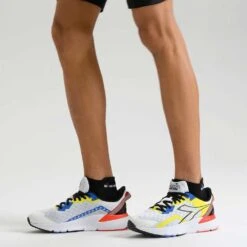 Diadora Men's Mythos Blushield Volo 3 Running Shoe- White/Black/Yellow Fluo - Regular (D) -The Famous Shoe Store 101.179090 C0008 CV