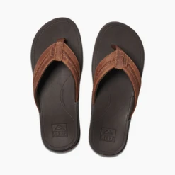 Men's Reef Leather Ortho-Coast Flip Flops -The Famous Shoe Store Men s Reef Leather Ortho Bounce Coast Flip Flop S 1 29041.1603629079