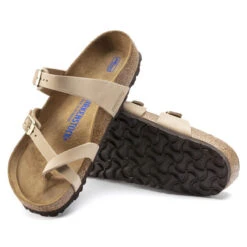 Women's Birkenstock Mayari Soft Footbed Nubuck Leather Sandal - Sandcastle -The Famous Shoe Store womens birkenstock mayari soft footbed sandal 1022212 SANDCSTL sandcastle bottom 84458.1655996224